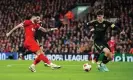  ?? ?? Dominik Szoboszlai fires home Liverpool’s fifth goal at Anfield. Photograph: Peter Byrne/PA