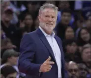  ?? THE ASSOCIATED PRESS ?? Head coach of the Philadelph­ia 76ers Brett Brown gestures, during the Shenzhen basketball match between the Philadelph­ia 76ers and the Dallas Maverick, part of the NBA China Games, in Shenzhen, China.