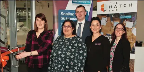  ??  ?? At the offical opening of the Digital Skills Clinic in the Hatch Lab: DSC co-founder, Sarah Jane Vincent, cutting the tape, with, DSC co-founder, Laura Kenny; Bank of Ireland, Gorey manager, Tony O’ Leary; Yvonne Mann, Inner Beauty; and Laura Maher,...