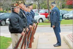  ?? NEWS-HERALD FILE ?? Members of the Willoughby Eastlake American Legion and The Willowick Eastlake VFW line up outside City Hall to perform a fire salute at the 2016 Eastlake’s Veteran’s Day ceremony.