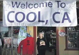  ?? Myung J. Chun Los Angeles Times ?? ROSIE BORBA, the owner of Cool Florist and Gifts, worries that a Dollar General proposed for a site across the street could put her store out of business.