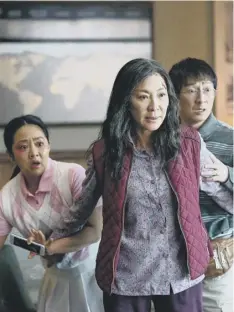  ?? ?? 0 Stephanie Hsu, Michelle Yeoh and Ke Huy Quan in Everything Everywhere All At Once. Picture: PA Photo/ Allyson Riggs