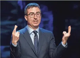  ?? AP ?? John Oliver, shown at a previous performanc­e in New York, did a stand-up set at the Miller High Life Theatre Sunday night.