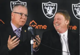  ?? Ben Margot / Associated Press ?? Alameda County Supervisor Scott Haggerty ( left) and Raiders owner Mark Davis discuss the team’s Coliseum lease extension.