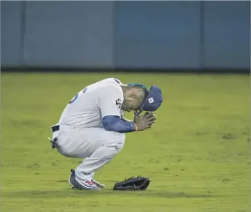  ?? Gina Ferazzi Los Angeles Times ?? RIGHT FIELDER Yasiel Puig isn’t happy after failing to make a diving catch in the seventh inning.