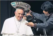  ?? REUTERS ?? Pope Francis receives a sombrero from Bolivian President Evo Morales during a World Meeting of Popular Movements in Santa Cruz on Thursday. The word ‘Tahuichi’ means “Big Bird”.