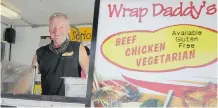  ?? Stuart Gradon/Calgary Herald ?? Wrap Daddy’s owner Mike Mortar says his Stampede food booth offers vegetarian and gluten-free food options for its patrons.