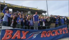  ?? ERIC BONZAR—THE MORNING JOURNAL ?? The football and soccer teams have supported each other during their respective playoff runs as the likes of wide receiver R.J. Sunahara, center, made the trip to MAPFRE Stadium on Nov. 11 to support the Rockets’ soccer team in the Division II state...