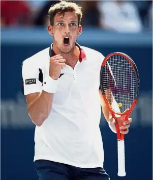  ?? — AP ?? Moving up: Pablo Carreno Busta of Spain pumping his fist after scoring a point against Diego Schwartzma­n of Argentina in the quarter-finals on Tuesday.