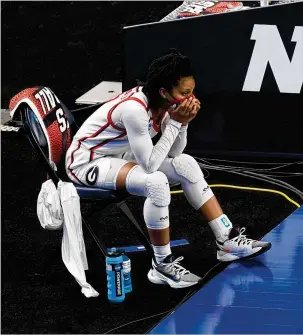  ?? ERIC GAY/ASSOCIATED PRESS ?? Gabby Connally watches from the sideline in the second half of Georgia’s 57-50, second-round NCAA Tournament loss to Oregon at the Alamodome in San Antonio.