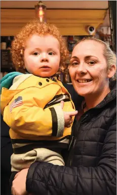  ?? by Michelle Cooper Galvin Photo ?? Garda Mary Gardiner and Oisin Burke enjoying the Coffee Morning in aid of Strictly Come Dancing in Reidy’s, Main Street, Killarney.