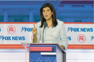  ?? MORRY GASH/AP ?? Former South Carolina Gov. Nikki Haley stood apart from her rivals at Wednesday’s GOP primary debate, David Brooks argues.