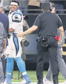  ?? /EFE ?? Cam Newton salió el domingo con aparentes síntomas de conmoción cerebral, pero muy pronto regresó a jugar.