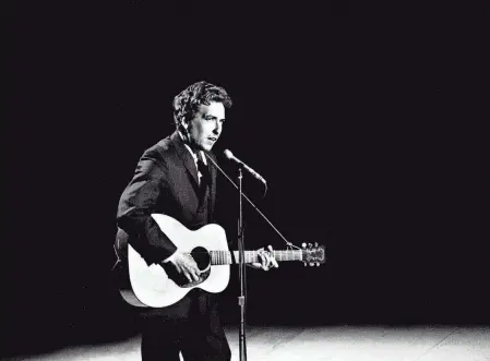  ?? JIMMY ELLIS / THE TENNESSEAN ?? Guest star Bob Dylan sings “I Threw It All Away” during a taping for the first episode of “The Johnny Cash Show” at the Ryman Auditorium on May 1, 1969.