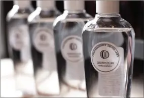  ?? PHOTO PROVIDED ?? Cooperstow­n Distillery recently donated 400 bottles of its “Cooper’s Clean” hand sanitizer to the city of Saratoga Springs.
