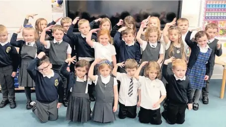  ??  ?? Video magic
Pupils throughout the school performed a video to accompany the track