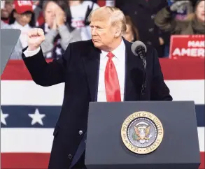  ?? Ben Gray / Associated Press ?? President Donald Trump addresses the crowd at a rally for U.S. Senators Kelly Loeffler, R-Ga., and David Perdue, R-Ga., who are both facing runoff elections Saturday, Dec. 5, in Valdosta, Ga.