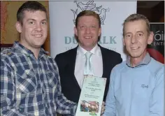  ??  ?? Michael Gunne Sponsor with Keith and Thomas Mullen of Mullen,s Roden place winners of the Best Business premises award in the Improve Our Town awards night.