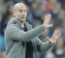  ?? — Reuters ?? Manchester City manager Pep Guardiola gestures.