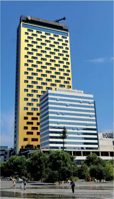  ?? Photo: Geci Group ?? Geci Group’s Interconti­nental Tirana, currently under constructi­on, in the background, with the Tirana Internatio­nal Hotel & Conference Centre in the foreground.