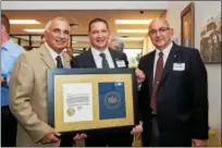  ?? SUBMITTED PHOTO ?? Gov. Tom Wolf recently presented a proclamati­on to Venezia Bulk Transport Inc. of Limerick, to mark the company’s 50 years in business. Shown here, from left, are owners Frank Venezia, Andrew Venezia, CEO and John Venezia