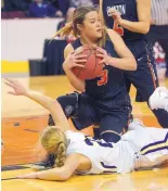  ?? GREG SORBER/JOURNAL ?? Clayton’s Brianna Fong (3) grabs the ball from Tucumcari’s Ashley Shipley, bottom, during their game Tuesday at the Santa Ana Star Center.