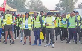  ?? ?? NEARLY TIME: The 15km walkers at the starting line