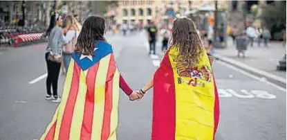  ?? (AP) ?? Camino al 21-D. Con el correr de las semanas, las esteladas y las banderas españolas volverán a ganar las calles.