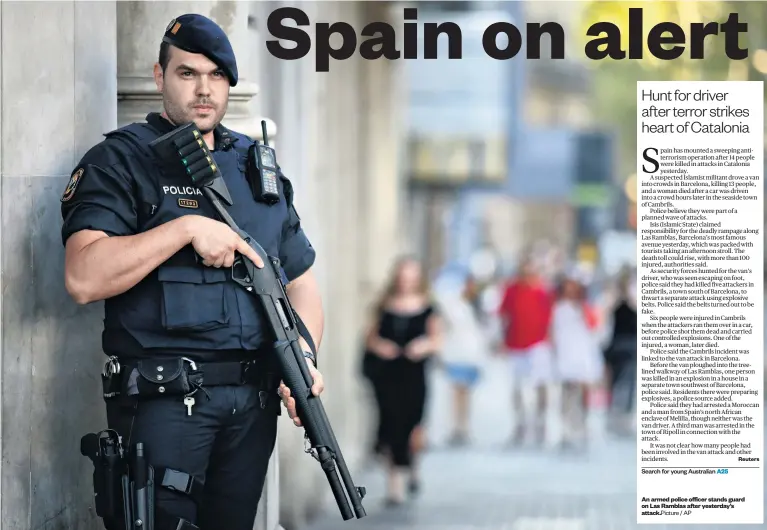  ?? Picture / AP ?? An armed police officer stands guard on Las Ramblas after yesterday’s attack.