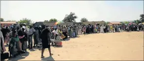  ?? Picture: FILE ?? LONG WAIT: Pensioners wait in a queue at a Sassa paypoint