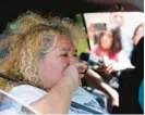  ?? ERIC GAY/AP ?? Grace Valencia, great aunt of victim Uziyah Garcia, tries to hold back tears Sunday as she speaks after picking up a copy of the Texas House investigat­ive committee report on the shootings at Robb Elementary School, in Uvalde, Texas.