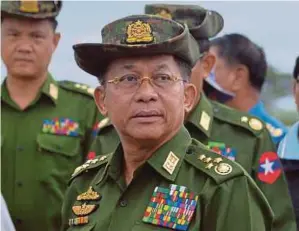  ?? AFP PIC ?? Myanmar military chief General Min Aung Hlaing will attend an Asean leaders’ special meeting in Jakarta tomorrow to discuss the crisis in his country. This will be his first overseas trip since the Feb 1 coup.