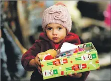  ??  ?? The shoebox appeal helps children in poverty at Christmas.