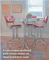  ??  ?? A retro table outfitted with stools makes an ideal breakfast nook.