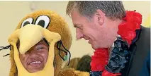  ?? PHOTO: ROSS GIBLIN/FAIRFAX NZ ?? Prime Minister Bill English and Mimisa Omeri at Windley School, Porirua.