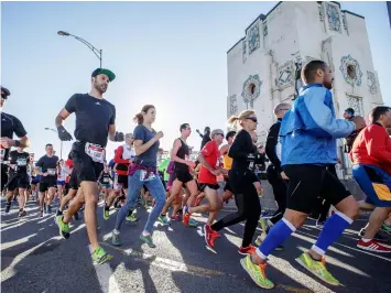  ?? DARIO AYALA/MONTREAL GAZETTE ?? Runners take part in the Rock ‘N’ Roll Montreal Marathon over the Jacques-Cartier Bridge. Despite the prevalence of exercise-induced muscle damage (EIMD) among long-distance runners, there’s no universall­y accepted evidenceba­sed treatment for...