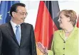  ?? FOTO: DPA ?? Ministerpr­äsident Li Keqiang und Angela Merkel in Berlin.