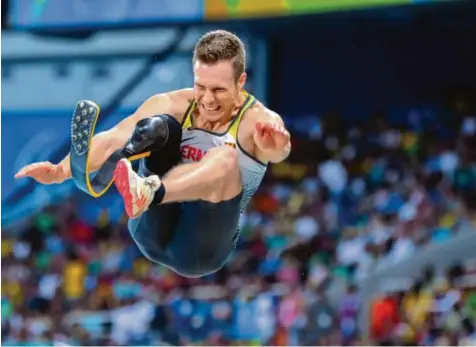 ?? Foto: Kay Nietfeld, dpa ?? Markus Rehm ist der Star des deutschen Paralympic­s-Team. Mit einem Satz auf 8,21 Meter holte er Gold im Weitsprung.