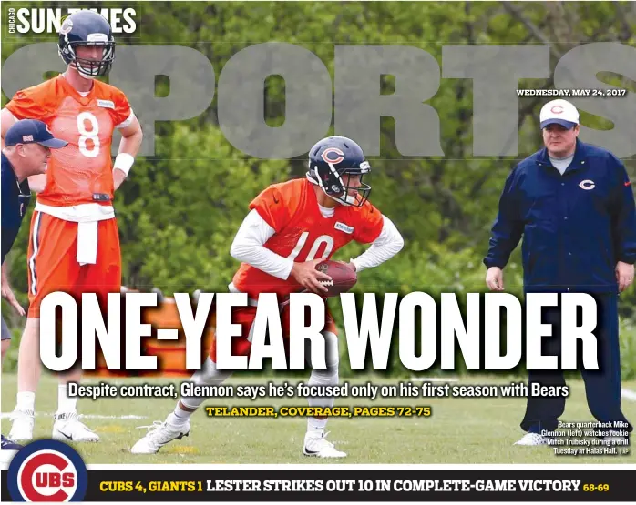  ?? | AP ?? Bears quarterbac­k Mike Glennon ( left) watches rookie Mitch Trubisky during a drill Tuesday at Halas Hall.