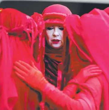  ?? Picture: JOHN GRAINGER ?? UTTER MADNESS: Protesters like these outside the Adani office in Sydney are says one letter writer. ‘controllin­g the Government’