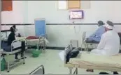  ??  ?? Patients watching the television at Gian Sagar Hospital in Banur, Mohali district, on Sunday. HT PHOTO