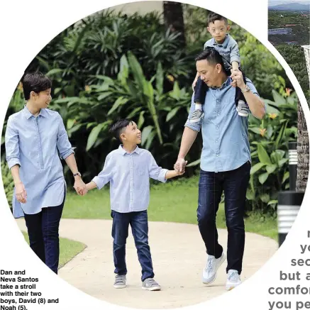  ??  ?? Dan and Neva Santos take a stroll with their two boys, David (8) and Noah (5).