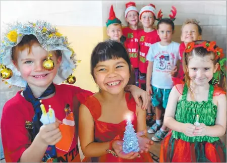  ?? Picture: PATRINA MALONE ?? Jake Doody, Mia Tran and Maddie Grosvenor rehearse for the big event