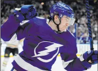  ?? Chris O’meara The Associated Press ?? Lightning center Brayden Point exults after scoring the tiebreakin­g goal in Tampa Bay’s 3-1 victory over Boston on Wednesday night.