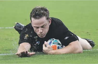  ?? Picture: AFP ?? FIVE-POINTER. All Blacks scrumhalf Brad Weber dives over for a try during their Rugby World Cup Pool B match against Canada at the Oita Stadium yesterday.