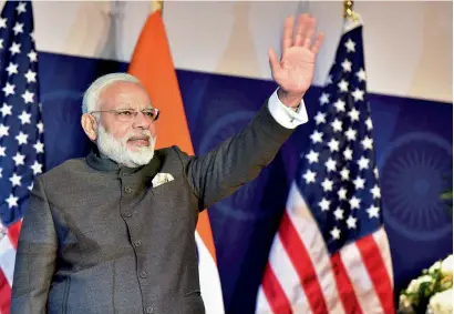  ?? PTI ?? Prime Minister Narendra Modi greets Indian diaspora during the United States community reception in Washington DC on Sunday. —