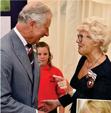  ??  ?? Looks familiar: The Prince enjoys a laugh yesterday with yogurt firm founder Rachel Cooper, whose style mirrors Camilla, right