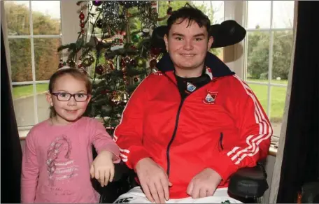  ??  ?? Rory Whelan with his sister Kelsey at his home on Friday.