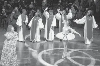  ?? STEPHEN M. DOWELL/ ORLANDO SENTINELPH­OTOS ?? Dancers and singers perform during the “Grand Celebratio­n” opening ceremony for the new Steinmetz Hall in the Dr. Phillips Center for the Performing Arts on Friday.