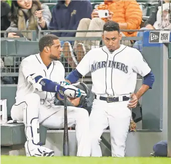  ?? JOE NICHOLSON/USA TODAY SPORTS ?? Robinson Cano, left, and Edwin Diaz, right, are expected to make an immediate impact with the Mets.